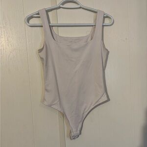 White small bodysuitt